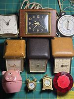 Group shot of all clocks and timers laid out