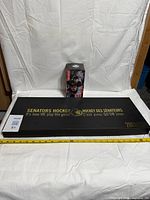 Closed presentation box and sealed Tim Stützle bobblehead