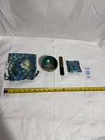 All four components laid out with tape measure for scale