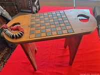 Top view showing checkerboard surface and checkers