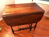 Top view with leaves closed showing wood grain