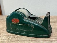 Left front view showing overall shape, green paint and red Durex decal