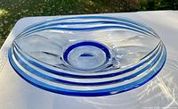 Top view showing bowl shape, blue stripes, clear crystal body
