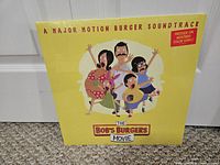 Front cover of The Bob's Burgers Movie soundtrack LP, shrink-wrapped