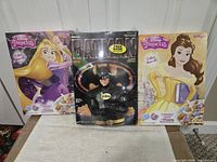 Disney Princess Rapunzel, Batman 1989, Disney Princess Belle cereal boxes