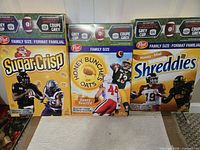 Post Sugar-Crisp, Honey Bunches of Oats and Honey Shreddies CFL Grey Cup boxes