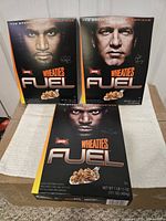 Front view of three Wheaties Fuel cereal boxes