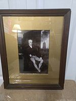 Front view showing framed portrait, mat and glass