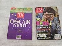 Front covers of Oscar Night and Austin Powers issues