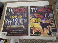 Two magazines: Sci-Fi Shows of the Millennium and Kids TV Spring Break