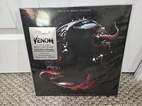 Front of sealed Venom Let There Be Carnage soundtrack LP showing numbered limited-edition sticker
