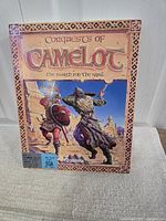 Front of Conquests of Camelot big-box showing title, artwork, Sierra logo, EGA system label