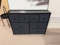 Front view of dresser showing eight drawers, frame and top