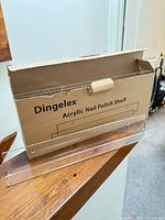 Retail box showing Dingelex branding and one shelf for scale