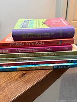 Spine view of all seven craft books stacked