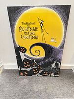 Front view of mounted poster showing full artwork