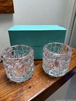 Front view showing both crystal votive holders with Tiffany blue box behind