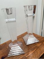 Pair of clear crystal candle holders front view