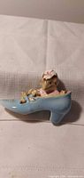 Left side view of Beswick mother mouse in blue shoe figurine