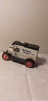 Side view of Ertl Model T Imperial Palace coin bank