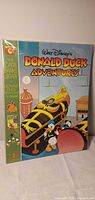 Front cover of Donald Duck Adventures Volume 2 comic in plastic sleeve