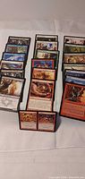 Front view showing stacks of Magic: The Gathering cards