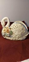 Full view of porcelain swan figurine