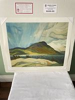 Full view of mounted, sealed print with certificate and price tag