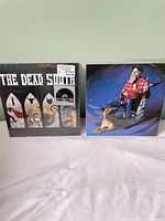 Front view of both vinyl records