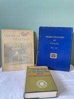 Front covers of all three hardcover books.