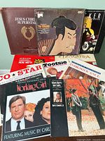 Group shot of ten soundtrack LPs showing front cover art