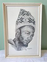 Front view of framed pencil portrait, shows artwork and frame