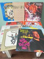 All ten soundtrack LPs fanned out to show front jackets