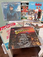 Front view showing eight identifiable soundtrack LPs with two more partially hidden