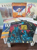 Top and front view of all soundtrack records showing identifiable titles and overall condition