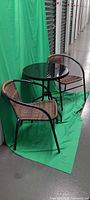 Full view of bistro set: table and two chairs