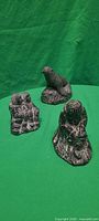 All three soapstone figures grouped