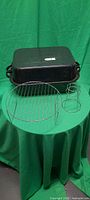 Overall lot: double roasting pan, round rack, vertical roaster stand