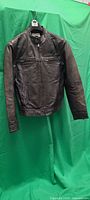 Front view of Lucky Brand leather jacket on hanger