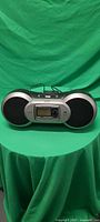 Front view of Sirius Sportster boombox with receiver docked