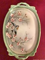 Top view of German lusterware tray showing bird and floral design