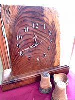 Front view of live edge clock with shakers and dish