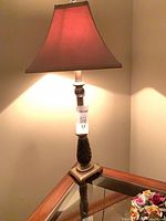 Full view of lamp showing shade, stem and base