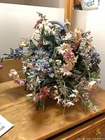 Silk flower basket arrangement