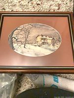 Rectangular frame with brown mat and winter farmhouse print