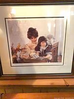 Full view of framed print showing artwork, matting and frame