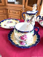 Cup, saucer, dessert plate, creamer