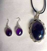 pendant and earrings showing size and style