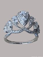 Front view of ring showing tiara design and cubic zirconia stones