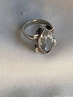 Top view of sterling silver ring showing marquise faceted quartz stone